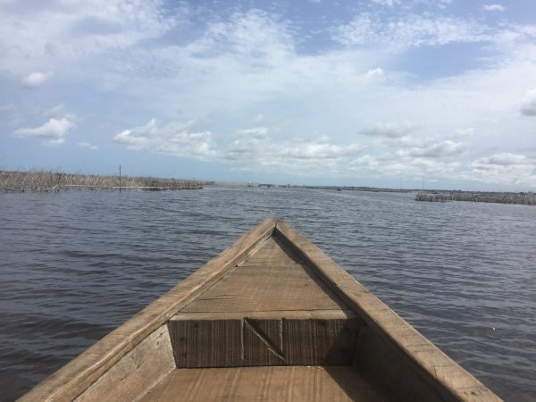 on a pirouge canoe in Benin